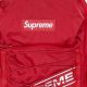 The Ultimate Red Supreme Backpack: Street Style for Backpackers! | Ultimate Backpack Traveler Guide: Tips, Destinations & Budget Hacks